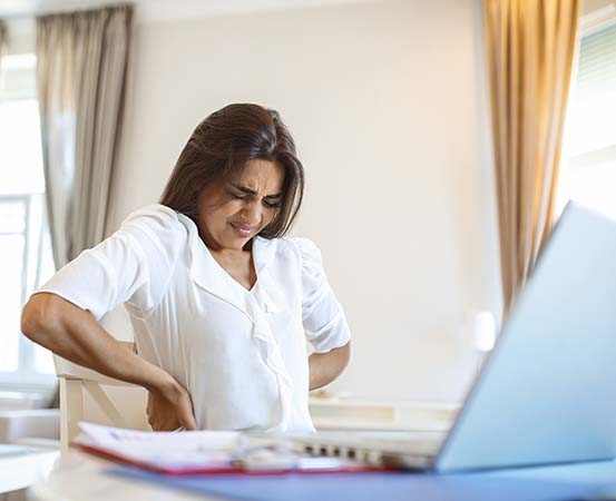 Most activities in daily life including reading, working (desk jobs), driving, and watching television are all done seated, and could cause back pain.