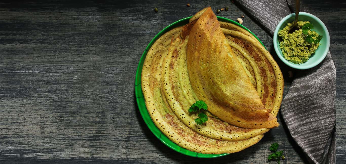 Green gram dosa served with coconut chutney 
