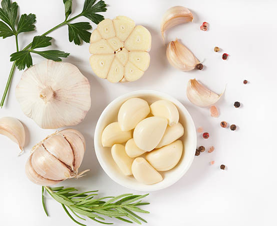 Adding garlic to our daily menu can improve heart health as it's a natural blood thinner.