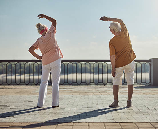 For older people participating in dance fitness workouts, certain safety considerations should be taken, including informing the instructor about their health and medical conditions. 
