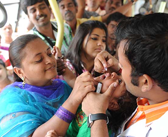 Children below five years are administered polio drops during Pulse Polio Program