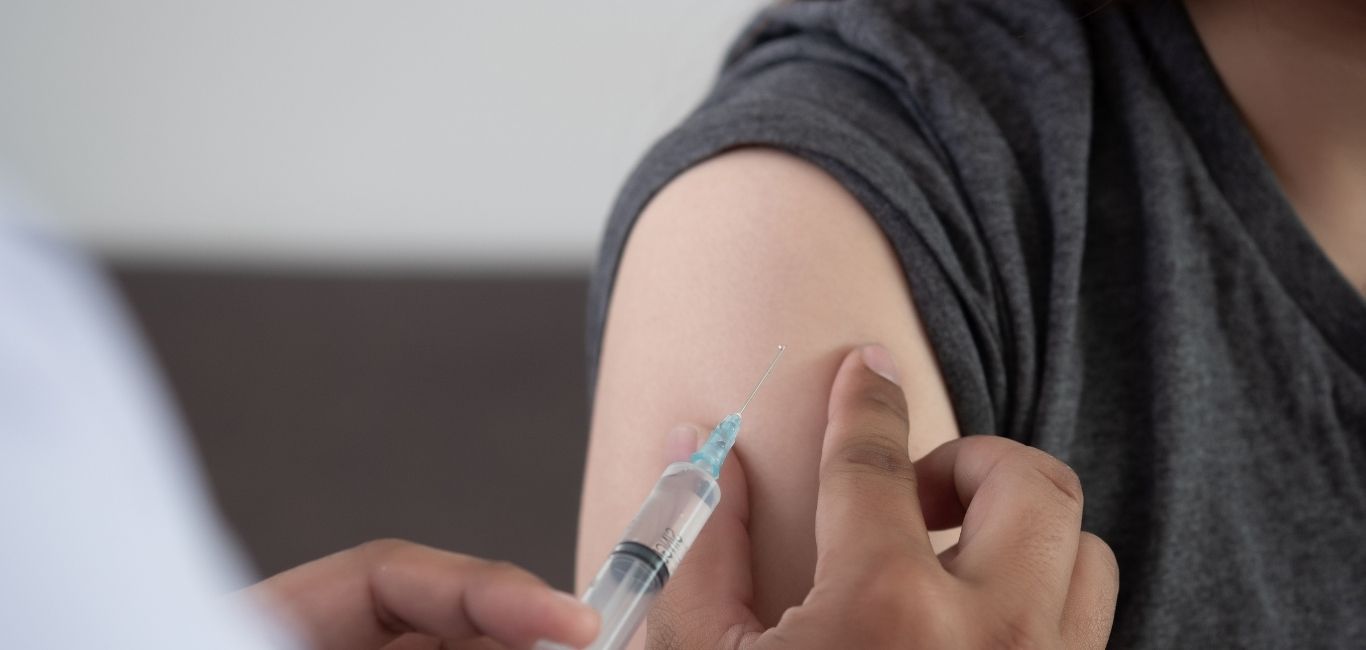 Image of a person getting a vaccine