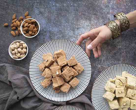 Can people with diabetes eat Diwali delicacies while managing their diet?