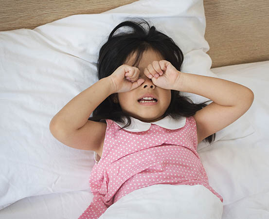 How is bedwetting in children related to stress and anxiety?