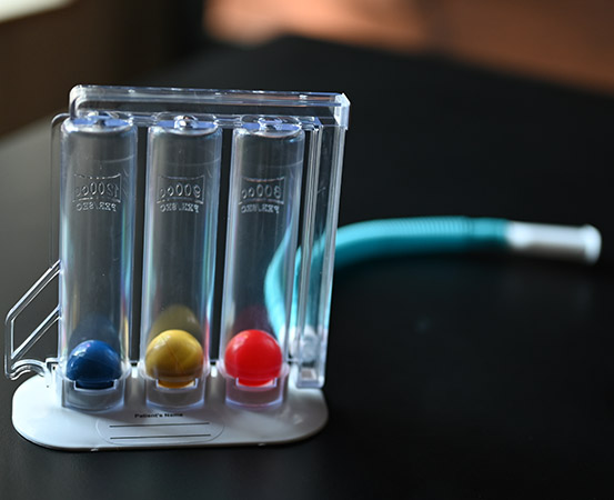 An incentive spirometer strengthens the respiratory muscles and improves lung function