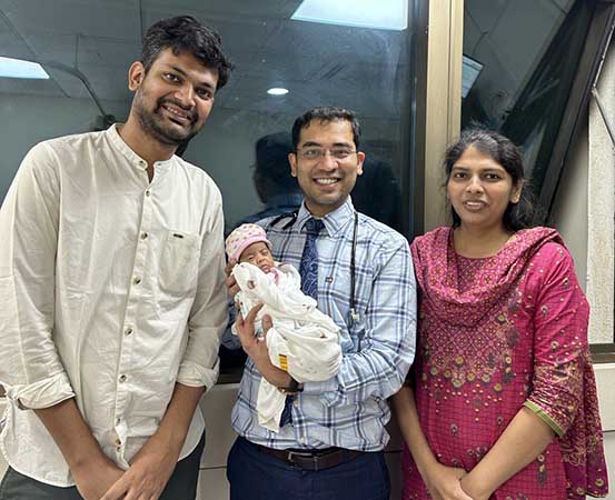 Rudhvi and her parents with Dr Anand Patil, who has experience treating preemies.